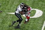 ATLANTA - SEPTEMBER 18: Jeremy Maclin #18 of the Philadelphia Eagles is tackled by Dunta Robinson #23 of the Atlanta Falcons at the Georgia Dome on September 18, 2011 in Atlanta, Georgia. Robinson would be penalized for leading with his helmet. (Photo by Scott Cunningham/Getty Images)