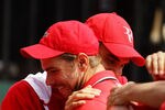 SYDNEY, AUSTRALIA - SEPTEMBER 19:  Stanislas Wawrinka (L) of Switzerland celebrates with Roger Federer (R) after winning his resumed Davis Cup World Group Playoff Tie match against Lleyton Hewitt of Australia at Royal Sydney Golf Club on September 19, 2011 in Sydney, Australia.  (Photo by Matt King/Getty Images)