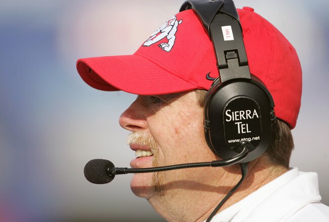 BOISE, ID - DECEMBER 27:  Fresno State head coach Pat Hill of the Fresno State Bulldogs watches the Virginia Cavaliers during the MPC Computers Bowl at Bronco Stadium on December 27, 2004 in Boise, Idaho. Fresno State defeated Virginia in overtime 37-34. (Photo by Jeff Gross/Getty Images)