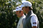 LEMONT, IL - SEPTEMBER 15:   Webb Simpson and Dustin Johnson walk off the 16th tee box during the first round of the BMW Championship at Cog Hill Golf & Country Club on September 15, 2011 in Lemont, Illinois.  (Photo by Hunter Martin/Getty Images)