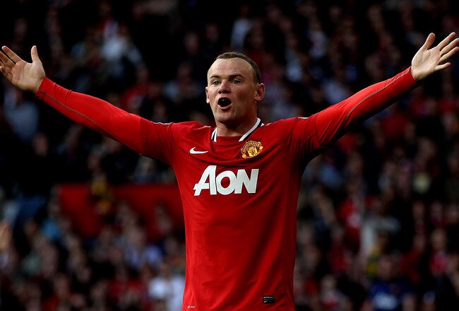 MANCHESTER, ENGLAND - SEPTEMBER 18:  Wayne Rooney of Manchester United reacts during the Barclays Premier League match between Manchester United and Chelsea at Old Trafford on September 18, 2011 in Manchester, England.  (Photo by Clive Brunskill/Getty Images)