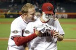 PHOENIX, AZ - SEPTEMBER 19:  Starting pitcher Ian Kennedy #31 of the Arizona Diamondbacks receives a shaving cream salute from J.J. Putz #40 after defeating the Pittsburgh Pirates in the Major League Baseball game at Chase Field on September 19, 2011 in Phoenix, Arizona.  The Diamondbacks defeated the Pirates 1-0. (Photo by Christian Petersen/Getty Images)