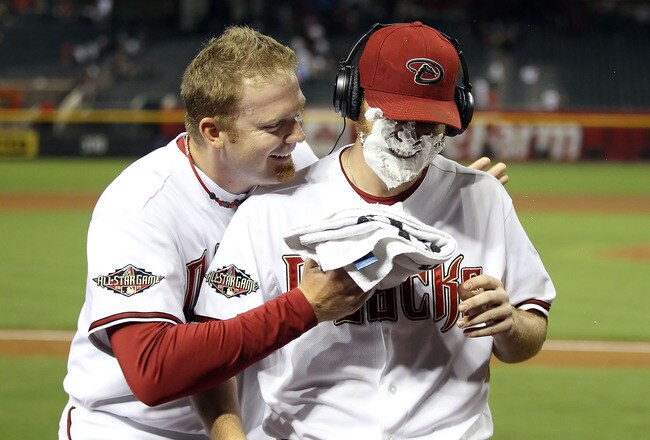 PHOENIX, AZ - SEPTEMBER 19:  Starting pitcher Ian Kennedy #31 of the Arizona Diamondbacks receives a shaving cream salute from J.J. Putz #40 after defeating the Pittsburgh Pirates in the Major League Baseball game at Chase Field on September 19, 2011 in Phoenix, Arizona.  The Diamondbacks defeated the Pirates 1-0. (Photo by Christian Petersen/Getty Images)