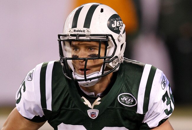 EAST RUTHERFORD, NJ - NOVEMBER 25:  Jim Leonhard #36 of the New York Jets runs with the ball against the Cincinnati Bengals at New Meadowlands Stadium on November 25, 2010 in East Rutherford, New Jersey. The Jets defeated the Bengal 26-10.  (Photo by Chris Trotman/Getty Images)