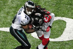 ATLANTA - SEPTEMBER 18: Jeremy Maclin #18 of the Philadelphia Eagles is tackled by Dunta Robinson #23 of the Atlanta Falcons at the Georgia Dome on September 18, 2011 in Atlanta, Georgia. Robinson would be penalized for leading with his helmet. (Photo by Scott Cunningham/Getty Images)