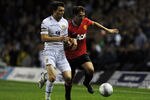 LEEDS, ENGLAND - SEPTEMBER 20:  Michael Owen (R) of Manchester United is tackled by Jonathan Howson of Leeds during the Carling Cup Third Round match between Leeds United and Manchester United at Elland Road on September 20, 2011 in Leeds, England.  (Photo by Gareth Copley/Getty Images)
