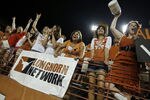 AUSTIN, TX - SEPTEMBER 3:  University of Texas fans cheer on the Longhorns as they play the Rice Owls on September 3, 2011 at Darrell K. Royal-Texas Memorial Stadium in Austin, Texas.  This was the debut game for the new Longhorn Network, a partnership between the University of Texas at Austin and ESPN. (Photo by Erich Schlegel/Getty Images)