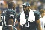 Philadephia Eagles Donovan McNabb talks with wide receiver Terrell Owens after a 59-yard McNabb to Owens touchdown pass    against the Dallas Cowboys on Monday Night Football November 15, 2005 at Texas Stadium.  (Photo by Al Messerschmidt/Getty Images)