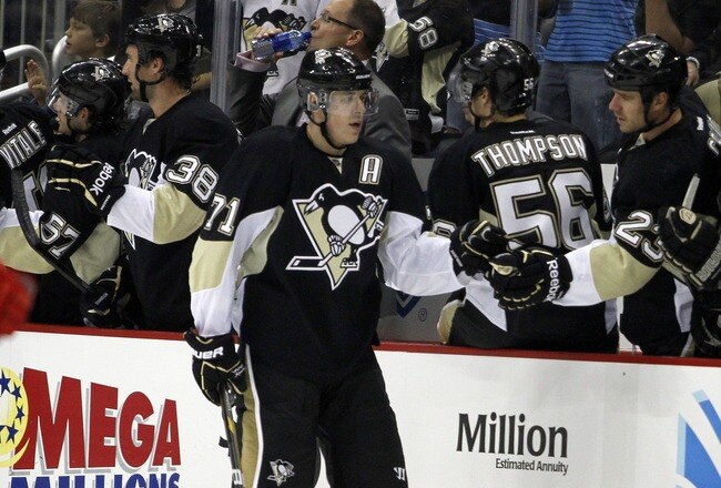 PITTSBURGH, PA - SEPTEMBER 21:  Evgeni Malkin #71 of the Pittsburgh Penguins celebrates his second period goal against the Detroit Red Wings during a preseason game at Consol Energy Center on September 21, 2011 in Pittsburgh, Pennsylvania.  (Photo by Justin K. Aller/Getty Images)