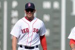 BOSTON, MA - SEPTEMBER 18:  Jacoby Ellsbury #2 (L) and Mike Aviles #3 of the Boston Red Sox warm up before the game against the Tampa Bay Rays at Fenway Park on September 18, 2011 in Boston, Massachusetts. The Rays won the game 8-5. (Photo by Darren McCollester/Getty Images)