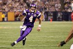 MINNEAPOLIS - NOVEMBER 07:  Quarterback Brett Favre #4 of the Minnesota Vikings runs with the ball against the Arizona Cardinals at Hubert H. Humphrey Metrodome on November 7, 2010 in Minneapolis, Minnesota.  The Vikings won 27-24 in overtime.  (Photo by Stephen Dunn/Getty Images)