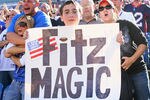 ORCHARD PARK, NY - SEPTEMBER 18: Fans of the Buffalo Bills show their support for their quarterback Ryan Fitzpatrick #14 against the Oakland Raiders at  Ralph Wilson Stadium on September 18, 2011 in Orchard Park, New York. Buffalo won 38-35.  (Photo by Rick Stewart/Getty Images)
