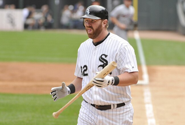 CHICAGO, IL - SEPTEMBER 10:  Adam Dunn #32 of the Chicago White Sox walks back to the dugout after striking out during the first inning against the Cleveland Indians at U.S. Cellular Field on September 10, 2011 in Chicago, Illinois.  (Photo by Brian Kersey/Getty Images)