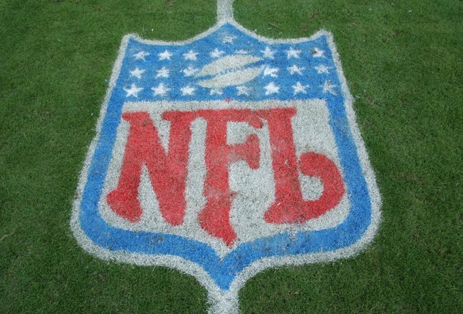 TAMPA, FL - DECEMBER 10:  The NFL Shield logo is shown on the field before the Tampa Bay Buccaneers game against the Atlanta Falcons on December 10, 2006 at Raymond James Stadium in Tampa, Florida. The Falcons defeated the Bucs 17-6. (Photo by Doug Pensinger/Getty Images)