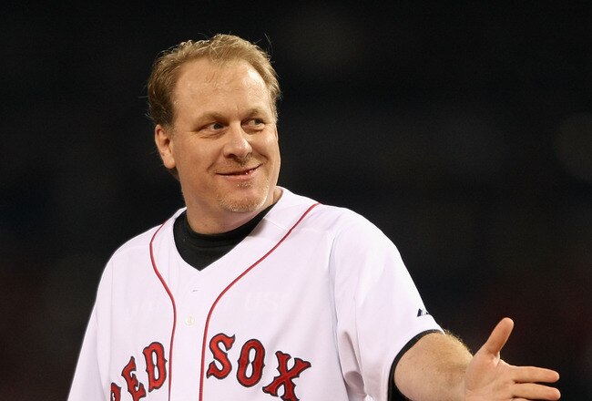 BOSTON - OCTOBER 16:  Curt Schilling of the Boston Red Sox throws out the first pitch of game five of the American League Championship Series against the Tampa Bay Rays during the 2008 MLB playoffs at Fenway Park on October 16, 2008 in Boston, Massachusetts.  (Photo by Elsa/Getty Images)