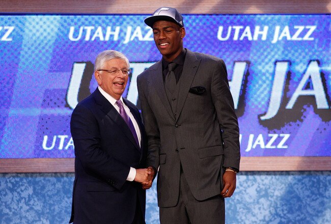 NEWARK, NJ - JUNE 23:  Alec Burks from the Colorado Buffalos greets NBA Commissioner David Stern after he was selected #12 overall by the Utah Jazz in the first round during the 2011 NBA Draft at the Prudential Center on June 23, 2011 in Newark, New Jersey.  NOTE TO USER: User expressly acknowledges and agrees that, by downloading and/or using this Photograph, user is consenting to the terms and conditions of the Getty Images License Agreement.  (Photo by Mike Stobe/Getty Images)