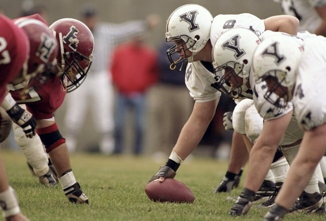 21 Nov 1998:  General view of the Harvard Crimson defensive line (left) lined up against the offensive line of the Yale Bulldogs during the game at the Harvard Stadium in Cambridge, Massachusetts. The Bulldogs defeated the Crimson 9-7. Mandatory Credit: Al Bello  /Allsport