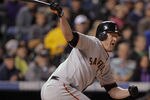 DENVER, CO - SEPTEMBER 17:  Aubrey Huff #17 of the San Francisco Giants takes an at bat against the Colorado Rockies at Coors Field on September 17, 2011 in Denver, Colorado.  (Photo by Doug Pensinger/Getty Images)