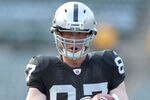 OAKLAND, CA - AUGUST 11:  Kevin Boss #87 of the Oakland Raiders warms up before the Raiders play the Arizona Cardinals at O.co Coliseum on August 11, 2011 in Oakland, California.  (Photo by Ezra Shaw/Getty Images)