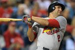 PHILADELPHIA, PA - SEPTEMBER 19: Lance Berkman #12 of the St. Louis Cardinals hits a home run in the first inning during the game against the Philadelphia Phillies at Citizens Bank Park on September 19, 2011 in Philadelphia, Pennsylvania. (Photo by Drew Hallowell/Getty Images)