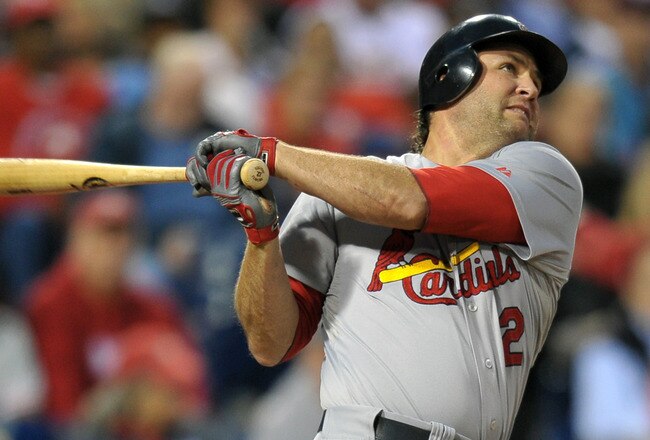 PHILADELPHIA, PA - SEPTEMBER 19: Lance Berkman #12 of the St. Louis Cardinals hits a home run in the first inning during the game against the Philadelphia Phillies at Citizens Bank Park on September 19, 2011 in Philadelphia, Pennsylvania. (Photo by Drew Hallowell/Getty Images)