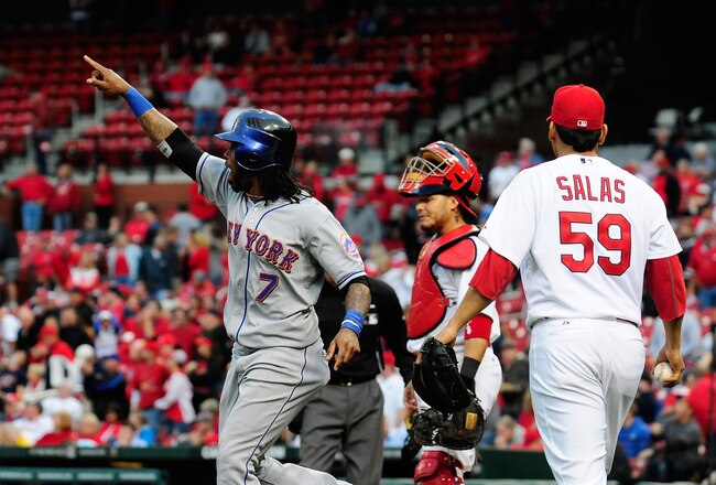 ST. LOUIS, MO - SEPTEMBER 22: Jose Reyes #7 of the New York Mets celebrates after scoring the game winning run on a single by Willie Harris #22 as Yadier Molina #4 and Fernando Salas #59 of the St. Louis Cardinals look on at Busch Stadium on September 22, 2011 in St. Louis, Missouri.  (Photo by Jeff Curry/Getty Images)
