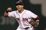 BOSTON - AUGUST 16:  Dustin Pedroia #15 of the Boston Red Sox reacts after the Red Sox turn a triple play against the Tampa Bay Rays in the third inning in the second game of a doubleheader at Fenway Park on August 16, 2011 in Boston, Massachusetts.  (Photo by Jim Rogash/Getty Images)