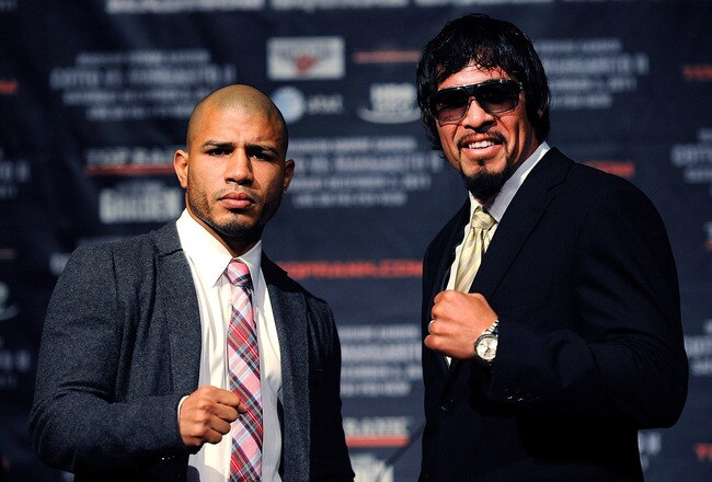 NEW YORK, NY - SEPTEMBER 20:  Professional boxers Miguel Cotto (L) and Antonio Margarito pose for the media after a press conference at the Edison Ballroom on September 20, 2011 in New York City.  (Photo by Patrick McDermott/Getty Images)