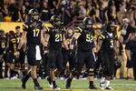 TEMPE, AZ - SEPTEMBER 09:  (L-R) Brock Osweiler #17, Colin Parker #21, Garth Gerhart #52 and Omar Bolden #3 of the Arizona State Sun Devils walk out to the overtime coin toss together during the college football game against the Missouri Tigers at Sun Devil Stadium on September 9, 2011 in Tempe, Arizona. The Sun Devils defeated the Tigers 37-30 in overtime. (Photo by Christian Petersen/Getty Images)
