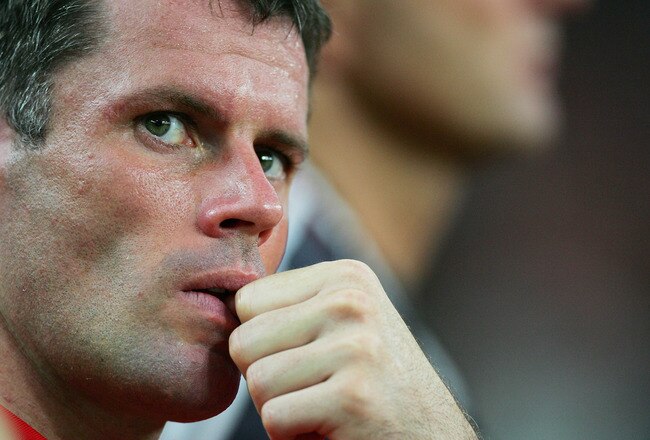 KUALA LUMPUR, MALAYSIA - JULY 16: Jamie Carragher of Liverpool watches from the touchline during the pre-season friendly match between Malaysia and Liverpool at the Bukit Jalil National Stadium on July 16, 2011 in Kuala Lumpur, Malaysia. (Photo by Stanley Chou/Getty Images)