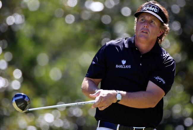 ATLANTA, GA - SEPTEMBER 24:  Phil Mickelson plays a shot on the 8th hole during the third round of THE TOUR Championship presented by Coca-Cola at East Lake Golf Club on September 24, 2011 in Atlanta, Georgia.  (Photo by Sam Greenwood/Getty Images)