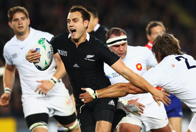 AUCKLAND, NEW ZEALAND - SEPTEMBER 24:  Israel Dagg of the All Blacks goes past Dimitri Szarzewski of France during the IRB 2011 Rugby World Cup Pool A match between New Zealand and France at Eden Park on September 24, 2011 in Auckland, New Zealand.  (Photo by Phil Walter/Getty Images)