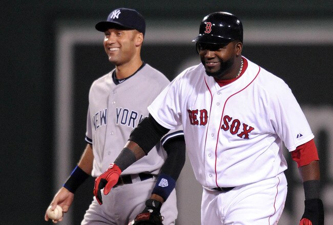 BOSTON, MA - SEPTEMBER 1:  David Ortiz #34 of the Boston Red Sox is tagged out by Derek Jeter #2 of the New York Yankees in the second inning at Fenway Park on September 1, 2011 in Boston, Massachusetts. The Yankees won the game 4-2. (Photo by Darren McCollester/Getty Images)