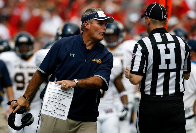 COLUMBUS, OH - SEPTEMBER 10:  Tim Beckman head coach of the Toledo Rockets argues a call with Head Linesman Brent Durbin during the third quarter of the game against the Ohio State Buckeyes on September 10, 2011 at Ohio Stadium in Columbus, Ohio. Ohio State defeated Toledo 27-22. (Photo by Kirk Irwin/Getty Images)