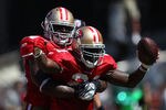SAN FRANCISCO, CA - SEPTEMBER 18:   Frank Gore #21 of the San Francisco 49ers celebrates after scoring against the Dallas Cowboys at Candlestick Park on September 18, 2011 in San Francisco, California.  (Photo by Jed Jacobsohn/Getty Images)