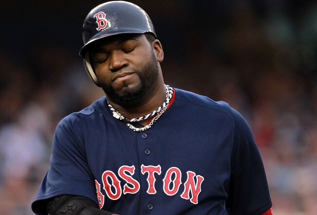 NEW YORK, NY - SEPTEMBER 24:  David Ortiz #34 of the Boston Red Sox reacts after flying out in the sixth inning against the New York Yankees on September 24, 2011 at Yankee Stadium in the Bronx borough of New York City.  (Photo by Nick Laham/Getty Images)
