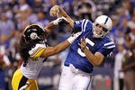 INDIANAPOLIS, IN - SEPTEMBER 25: Troy Polamalu #43 of the Pittsburgh Steelers hits Kerry Collins #5 of the Indianapolis Colts in the first half at Lucas Oil Stadium on September 25, 2011 in Indianapolis, Indiana. (Photo by Joe Robbins/Getty Images)