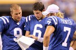 INDIANAPOLIS, IN - AUGUST 19:  Mike Hartline #9, Dan Orlovsky#6  and Curtis Painter #7 of the Indianapolis Colts look at play sheets during the game against the Washington Redskins at Lucas Oil Stadium on August 19, 2011 in Indianapolis, Indiana.  (Photo by Andy Lyons/Getty Images)