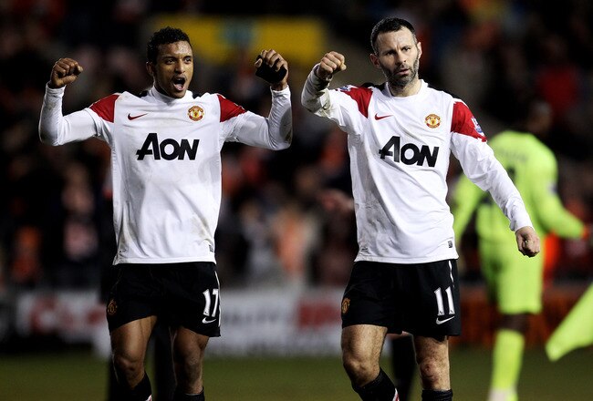 BLACKPOOL, ENGLAND - JANUARY 25:  Ryan Giggs of Manchester United celebrates with team mate Nani (L) at the end of the Barclays Premier League match between Blackpool and Manchester United at Bloomfield Road on January 25, 2011 in Blackpool, England. (Photo by Alex Livesey/Getty Images)