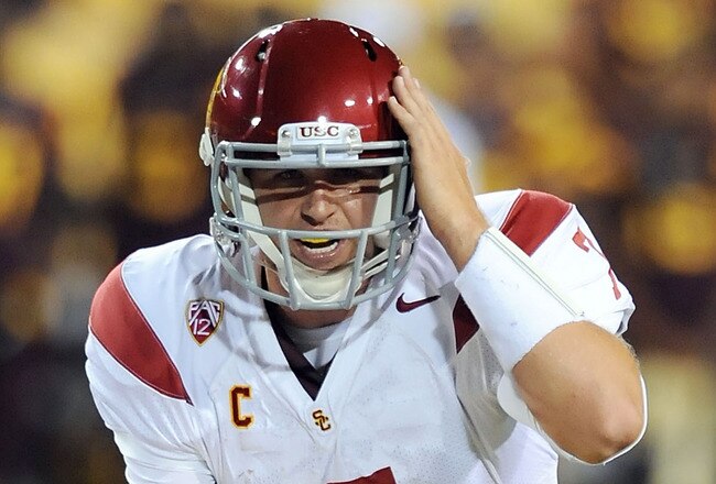TEMPE, AZ - SEPTEMBER 24: Matt Barkley #7 of the University of Southern California Trojans calls a signal at the line of scrimmage against the Arizona State Sun Devils at Sun Devil Stadium on September 24, 2011 in Tempe, Arizona.  (Photo by Norm Hall/Getty Images)