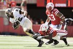 LINCOLN, NEBRASKA - SEPTEMBER 11: Nebraska Cornhuskers defensive back DeJon Gomes #7 trips up Idaho Vandals wide receiver Daniel Hardy #88 during second half action of their game at Memorial Stadium on September 4, 2010 in Lincoln, Nebraska. Nebraska defeated Idaho 38-17. (Photo by Eric Francis/Getty Images)