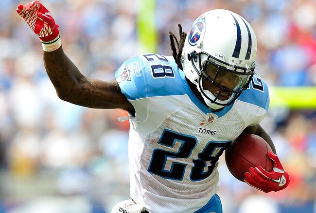 NASHVILLE, TN - SEPTEMBER 18:  Terrell Suggs #55 of the Baltimore Ravens tackles Chris Johnson #28 f the Tennessee Titans  at LP Field on September 18, 2011 in Nashville, Tennessee. Tennessee won 26-13.  (Photo by Grant Halverson/Getty Images)