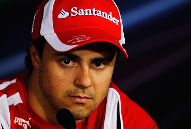 MONZA, ITALY - SEPTEMBER 08:  Felipe Massa of Brazil and Ferrari talks at the drivers press conference during previews to the Italian Formula One Grand Prix at the Autodromo Nazionale di Monza on September 8, 2011 in Monza, Italy.  (Photo by Paul Gilham/Getty Images)