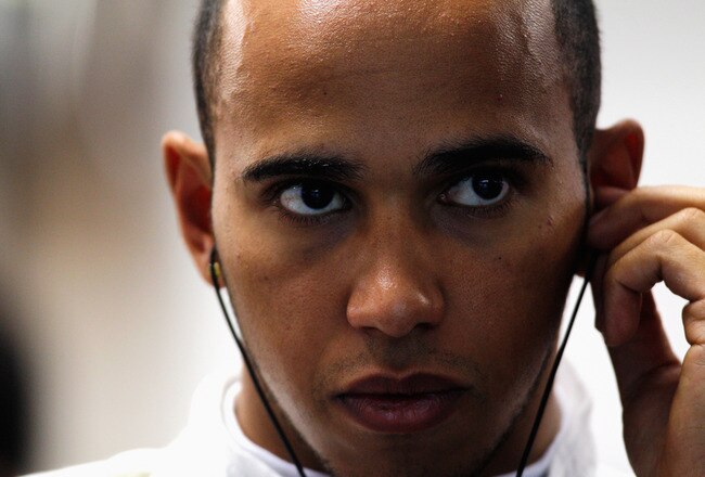 SINGAPORE - SEPTEMBER 24:  Lewis Hamilton of Great Britain and McLaren prepares to drive during the final practice session prior to qualifying for the Singapore Formula One Grand Prix at the Marina Bay Street Circuit on September 24, 2011 in Singapore.  (Photo by Paul Gilham/Getty Images)