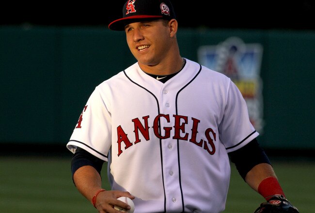 ANAHEIM, CA - AUGUST 19:  Outfielder Mike Trout #27 of the Los Angeles Angels of Anaheim warms up before the game with the Baltimore Orioles on August 19, 2011 at Angel Stadium in Anaheim, California.  (Photo by Stephen Dunn/Getty Images)