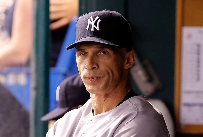 ST. PETERSBURG, FL - SEPTEMBER 26:  Manager Joe Girardi #28 of the New York Yankees directs his team against the Tampa Bay Rays during the game at Tropicana Field on September 26, 2011 in St. Petersburg, Florida.  (Photo by J. Meric/Getty Images)