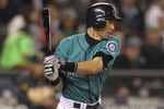 SEATTLE - SEPTEMBER 26:  Ichiro Suzuki #51 of the Seattle Mariners singles in the seventh inning against the Oakland Athletics at Safeco Field on September 26, 2011 in Seattle, Washington. (Photo by Otto Greule Jr/Getty Images)