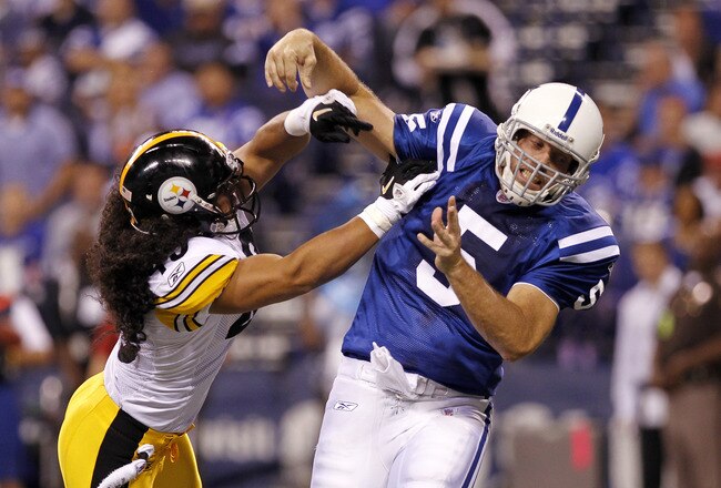 INDIANAPOLIS, IN - SEPTEMBER 25: Troy Polamalu #43 of the Pittsburgh Steelers hits Kerry Collins #5 of the Indianapolis Colts in the first half at Lucas Oil Stadium on September 25, 2011 in Indianapolis, Indiana. (Photo by Joe Robbins/Getty Images)