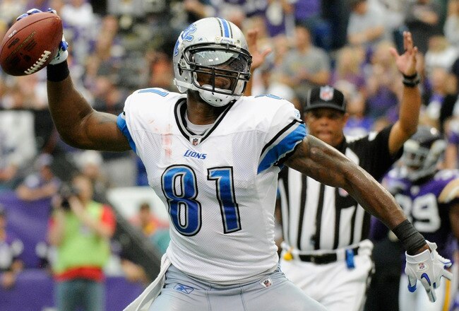 MINNEAPOLIS, MN - SEPTEMBER 25: Calvin Johnson #81 of the Detroit Lions celebrates scoring a touchdown in the fourth quarter against the Minnesota Vikings on September 25, 2011 at Hubert H. Humphrey Metrodome in Minneapolis, Minnesota. The Lions defeated the Vikings 26-23. (Photo by Hannah Foslien/Getty Images)