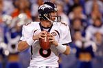INDIANAPOLIS - DECEMBER 13:  Kyle Orton #8 of the Denver Broncos  passes the ball during the NFL game against the Indianapolis Colts at Lucas Oil Stadium on December 13, 2009 in Indianapolis, Indiana.  The Colts won 28-16.  (Photo by Andy Lyons/Getty Images)